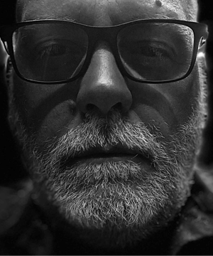 Photo of George C. Romero, click to book