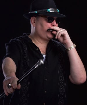 Photo of John Popper, click to book